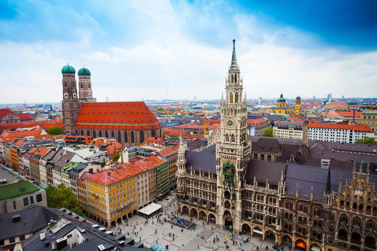 beautiful city centre view of Marienplatz, New Town Hall (Neues Rathaus), Glockenspiel, Frauenkirche with sky in Munich, (Bavaria, Germany)