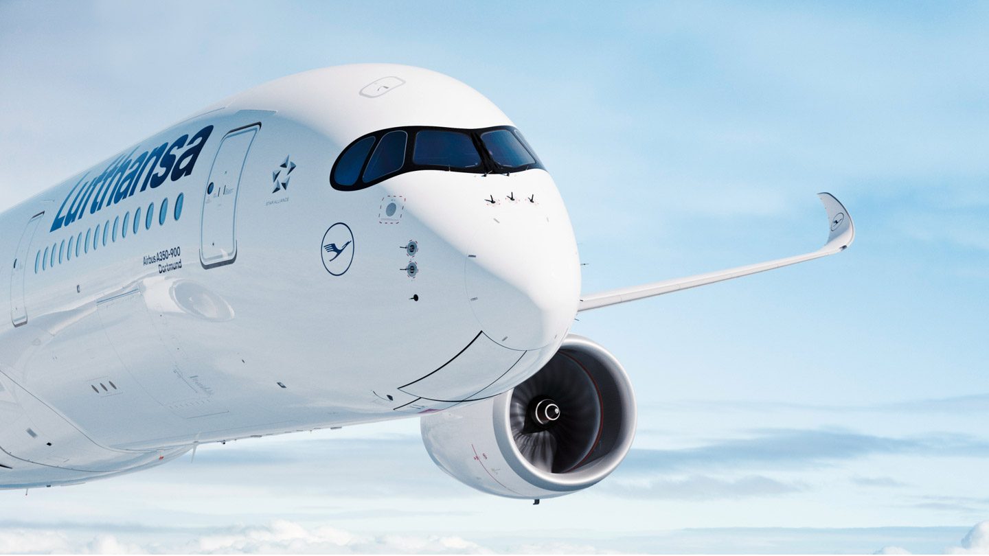 Lufthansa Airbus A350-900 soaring above the clouds.