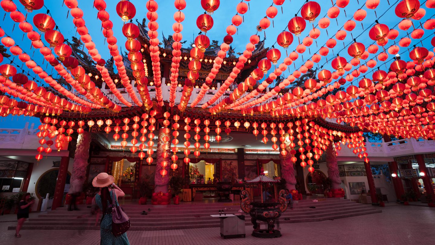 The Thean Hou Temple in Kuala Lumpur decorated with hundreds of red lanterns at dusk
