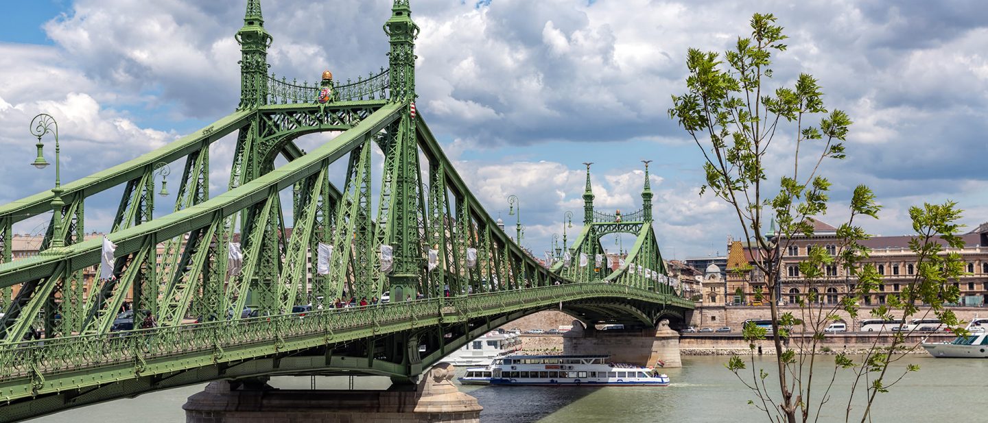 Liberty Bridge over the Danube under cloudy skies