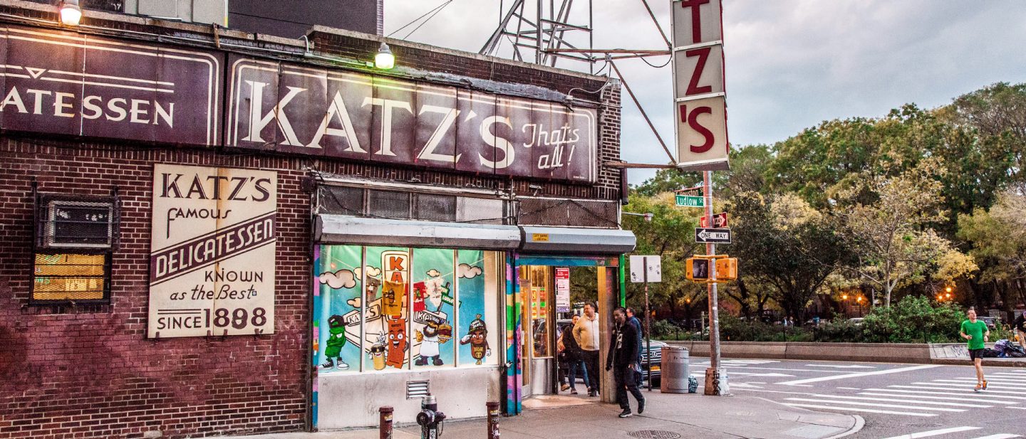 Exterior of Katz's Delicatessen on a New York City street corner