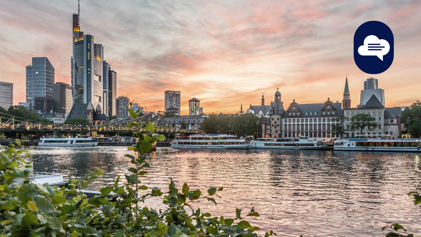 Team Stories: Skyline of Frankfurt and the Main at dusk